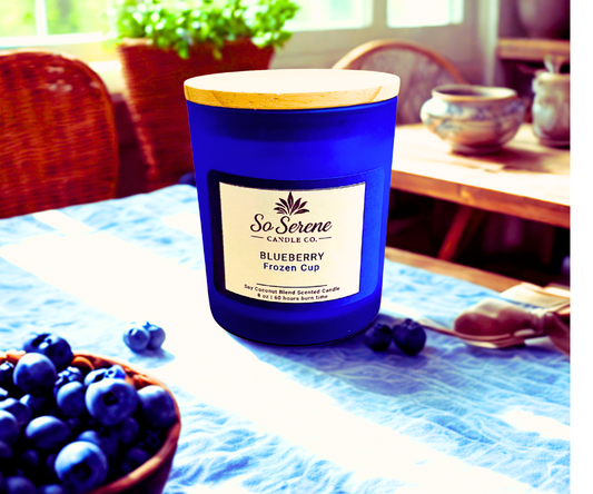 Blueberry Frozen Cup candle in a clear blue glass jar